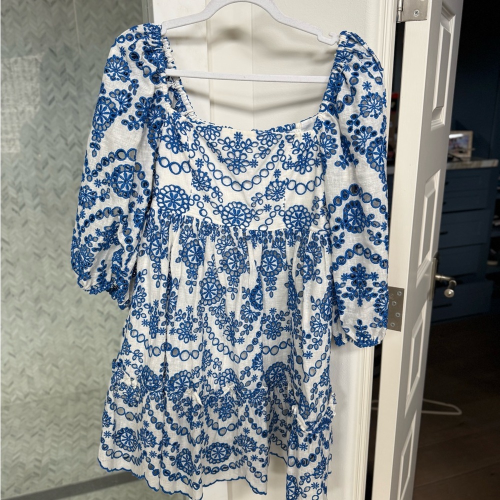 Gorgeous Cara Cara blue and white dress; laser cut details. Perfect for spring.